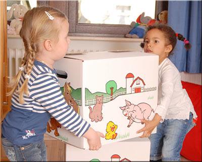 Children packing boxes